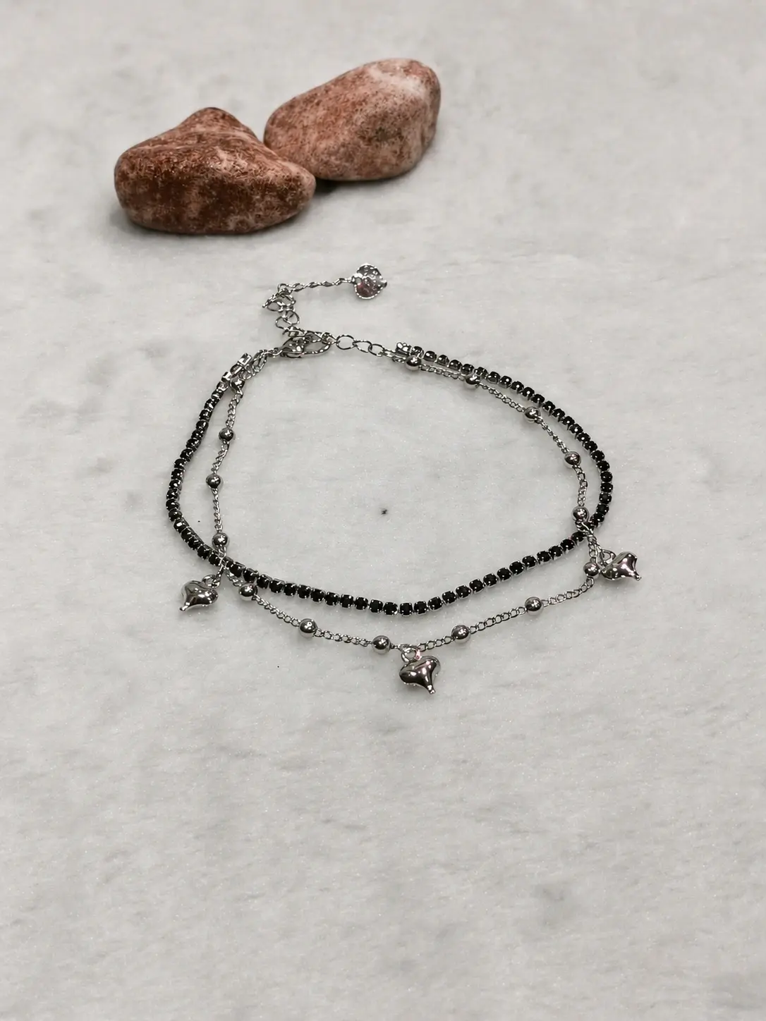 black stone dolphin charm anklet with silver layered chains