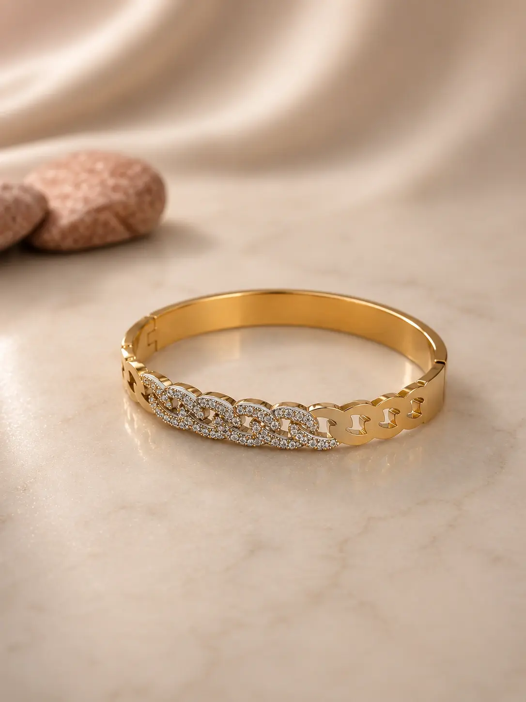 gold chain stone bangle with interlocking clear accent motifs