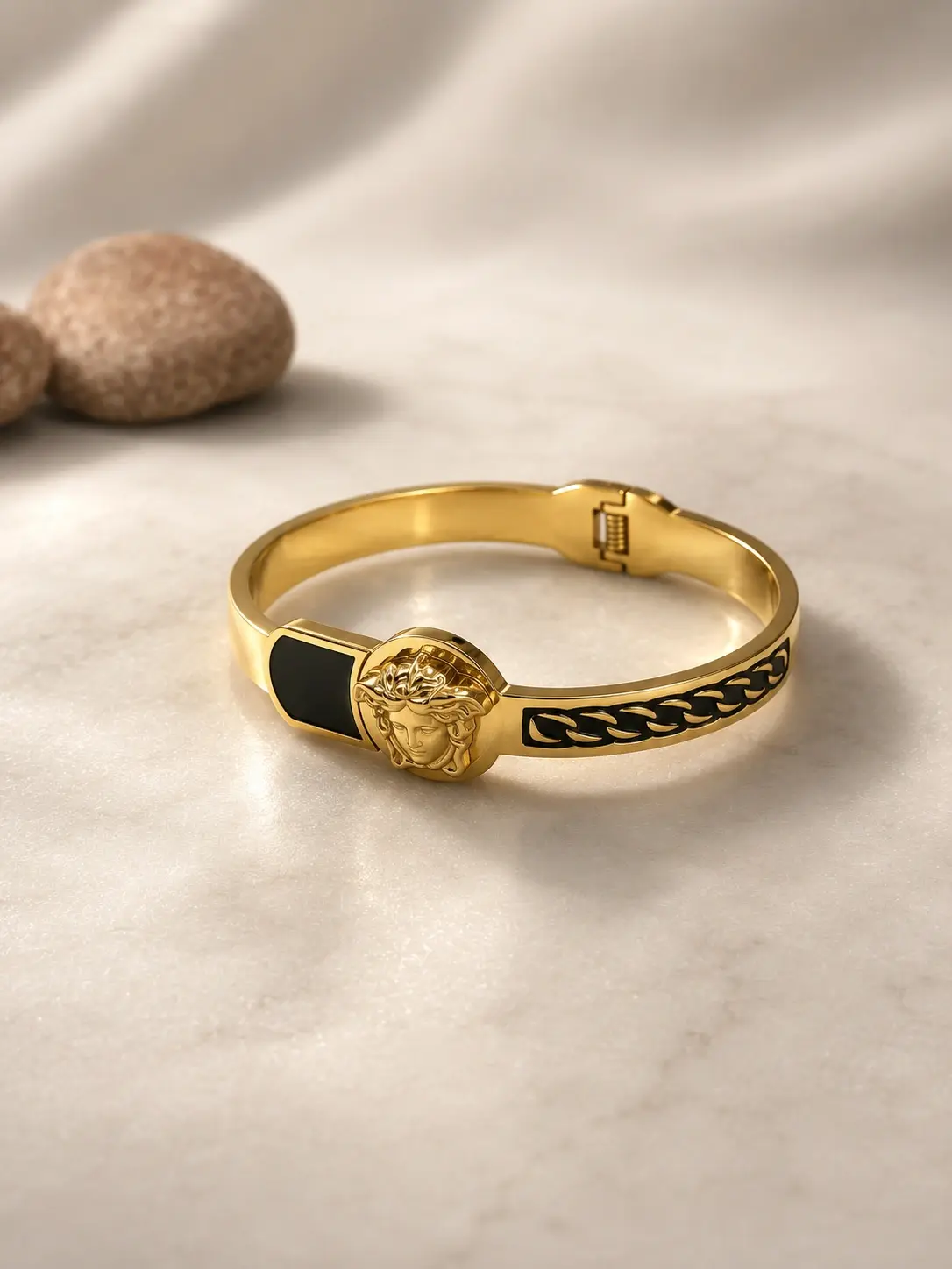 gold black face chain bangle with classical center motif