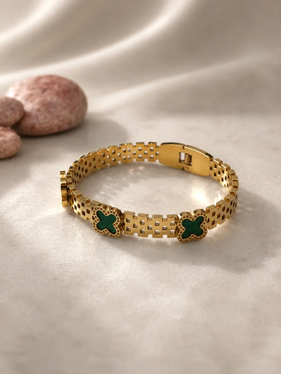 gold tone green clover bangle with two green motifs