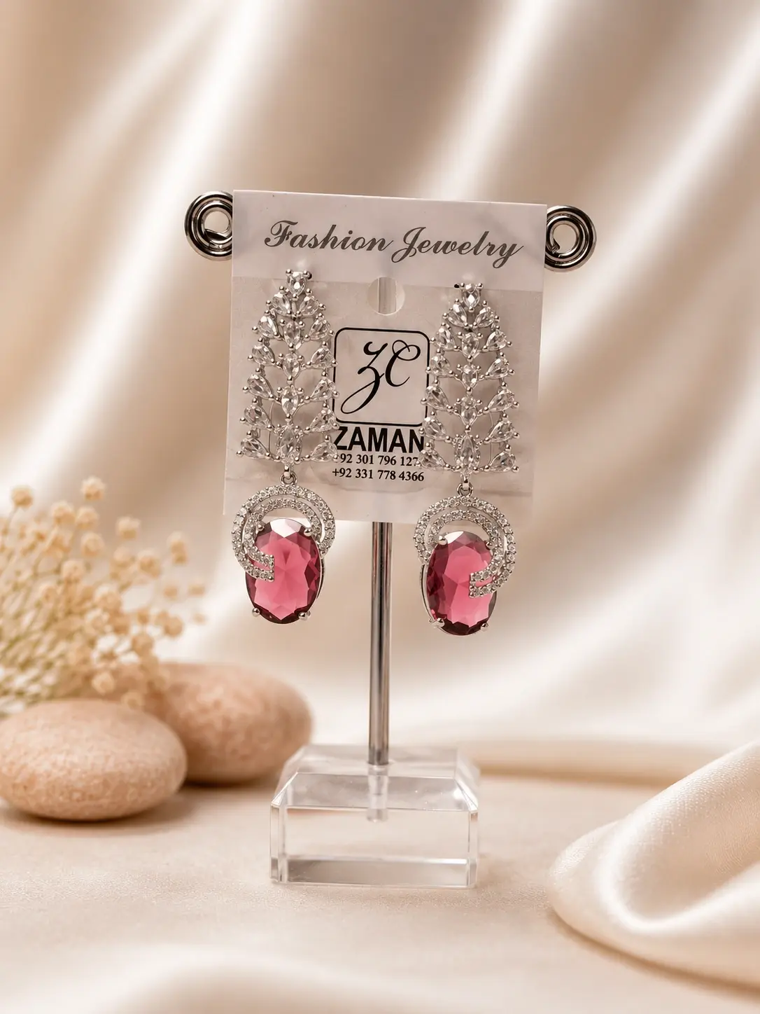 Pink Oval Leaf Cascade Earrings with clear leafy sections and silver-tone curved borders