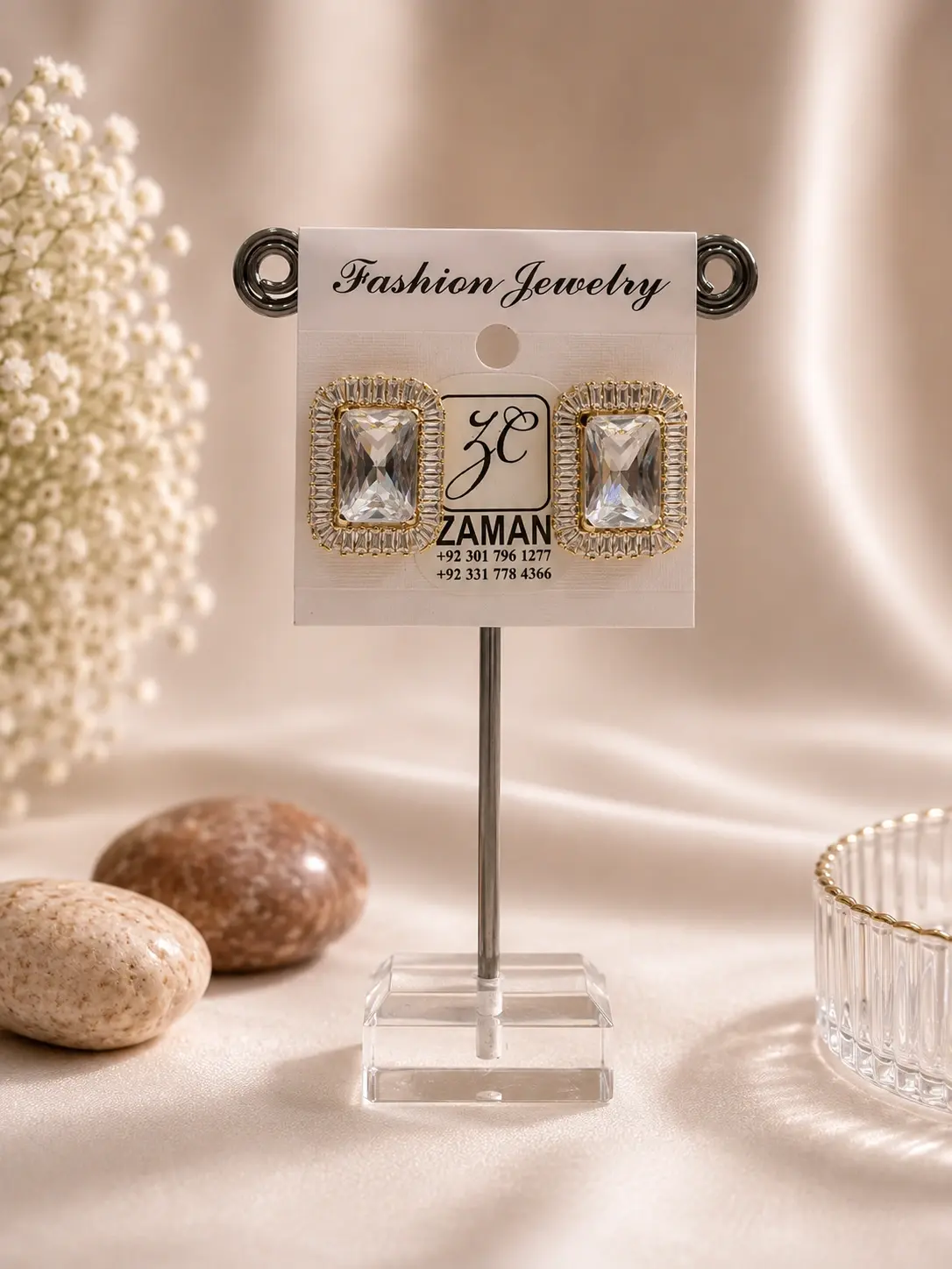 Gold Baguette Frame Stud Earrings with clear rectangular centers and elongated border details