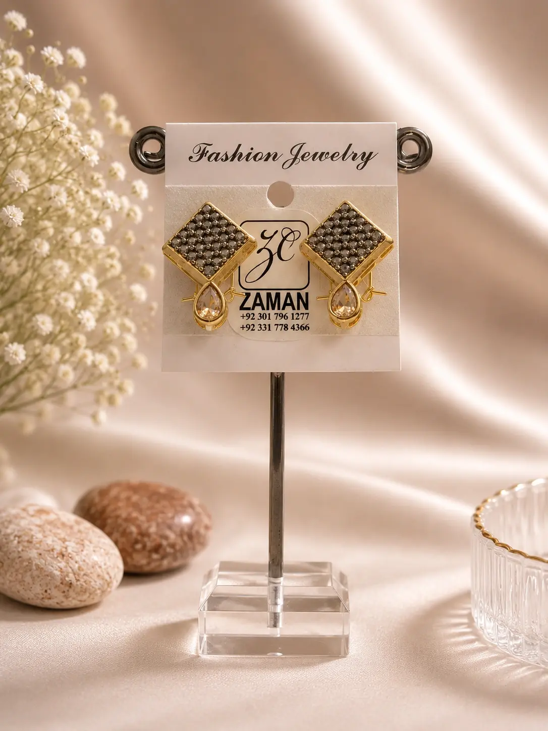 Gold Square Teardrop Drop Earrings with detailed square tops and clear hanging accents