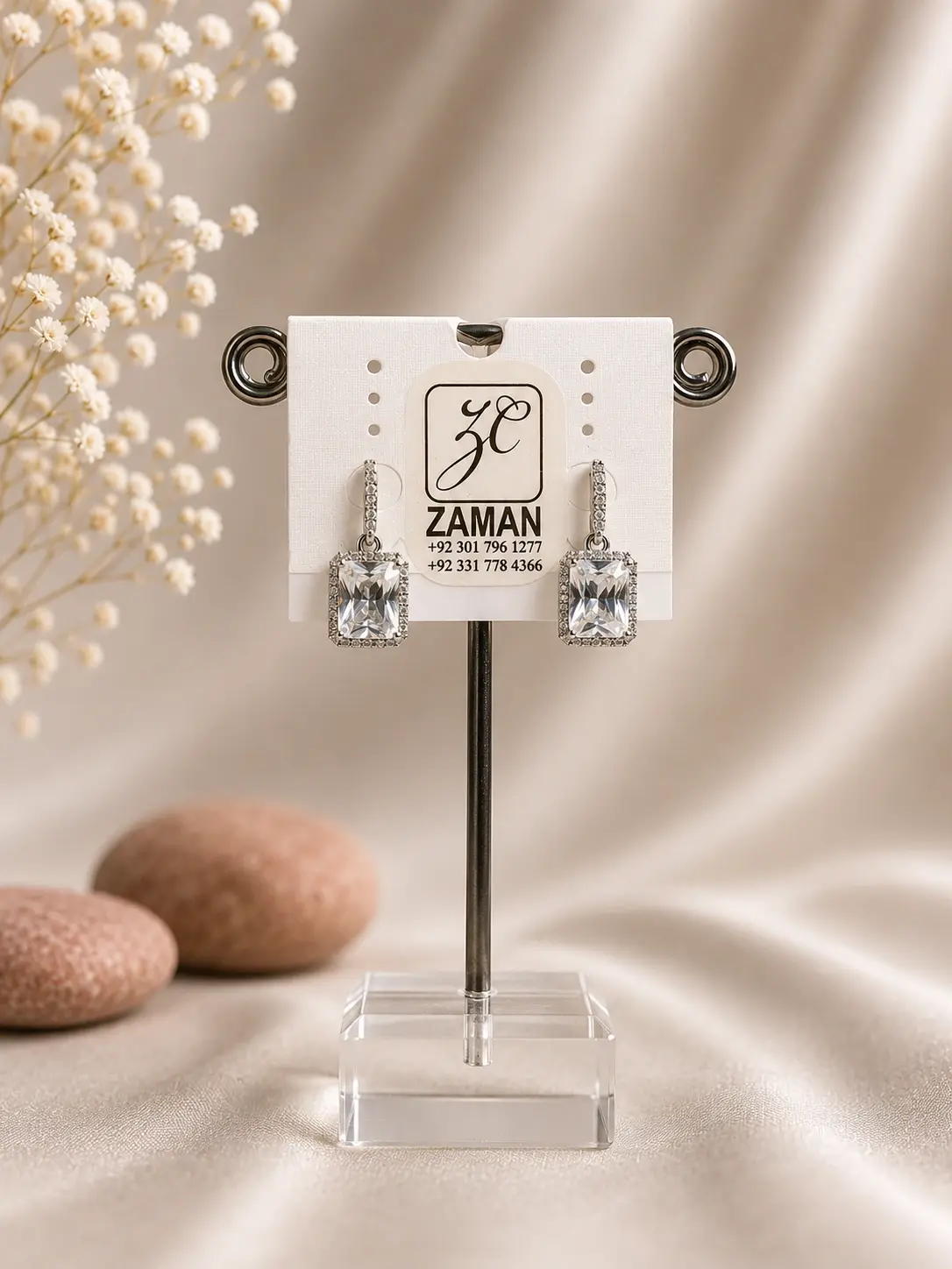 Silver Rectangular Halo Drop Earrings with clear geometric centers and detailed borders