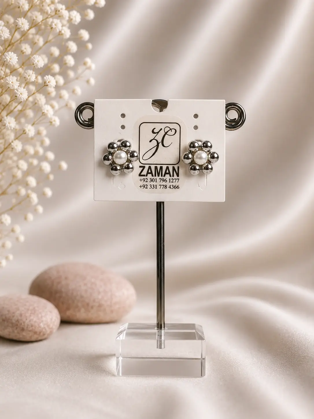 Silver Beaded Flower Stud Earrings with creamy white centers and polished round bead petals