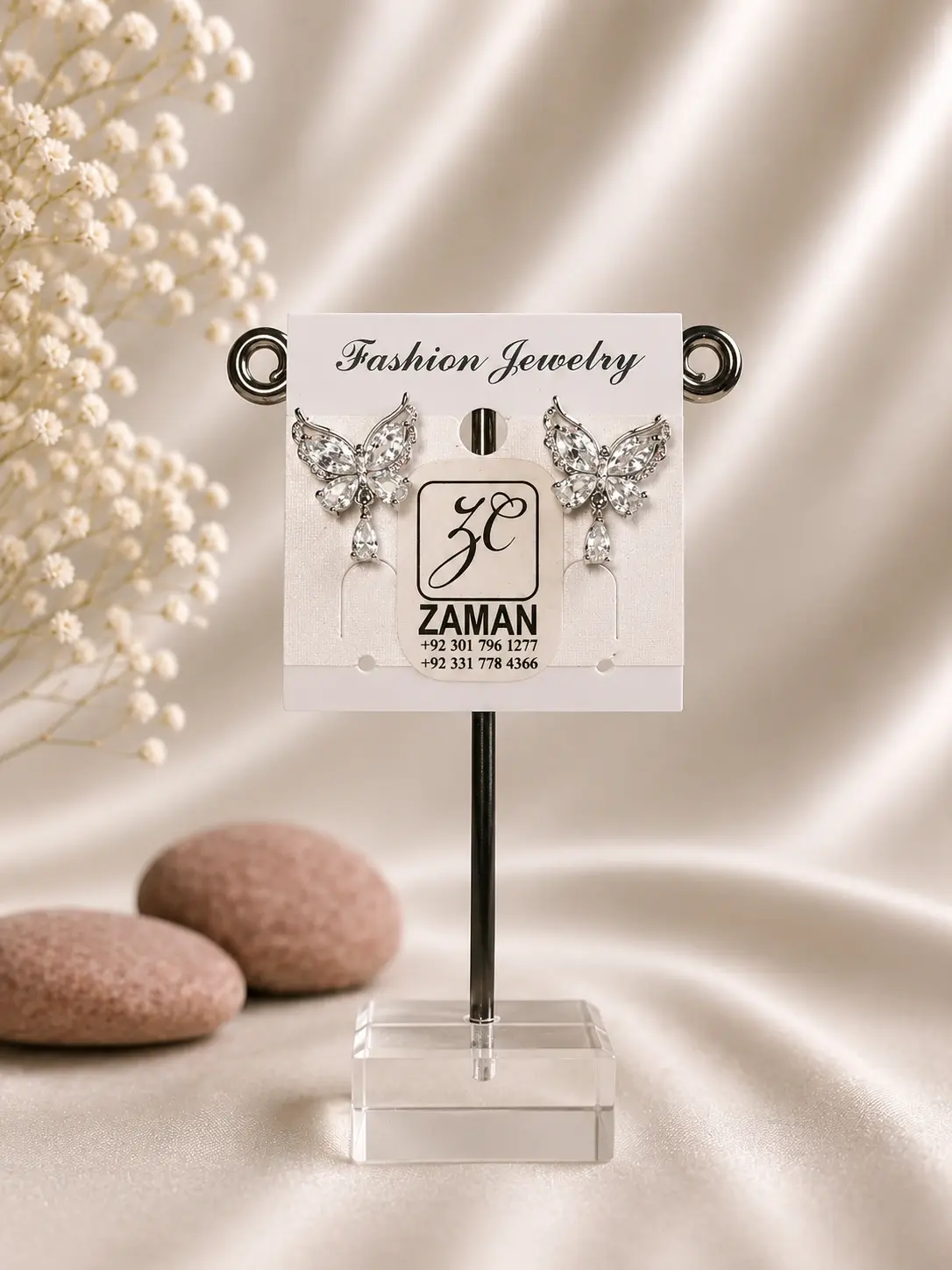 Silver Winged Butterfly Drop Earrings with clear wings and hanging teardrop accents