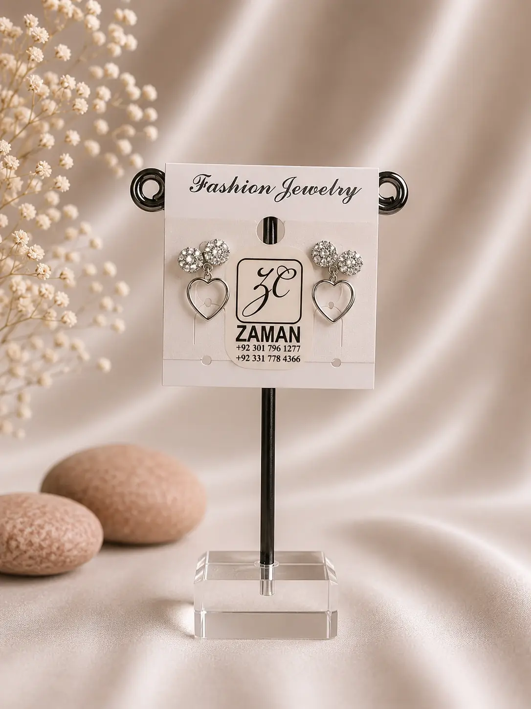 Silver Twin Cluster Heart Earrings with sparkling round tops and polished open-heart drops