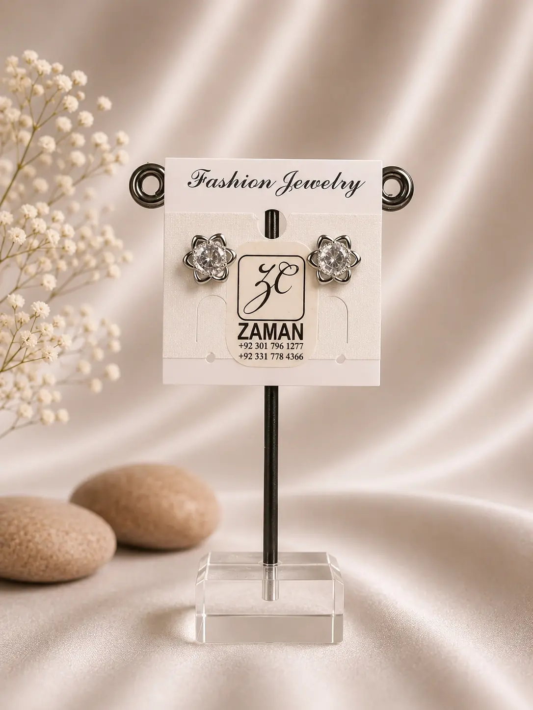 Silver Petal Halo Stud Earrings with clear round centers and six polished floral loops