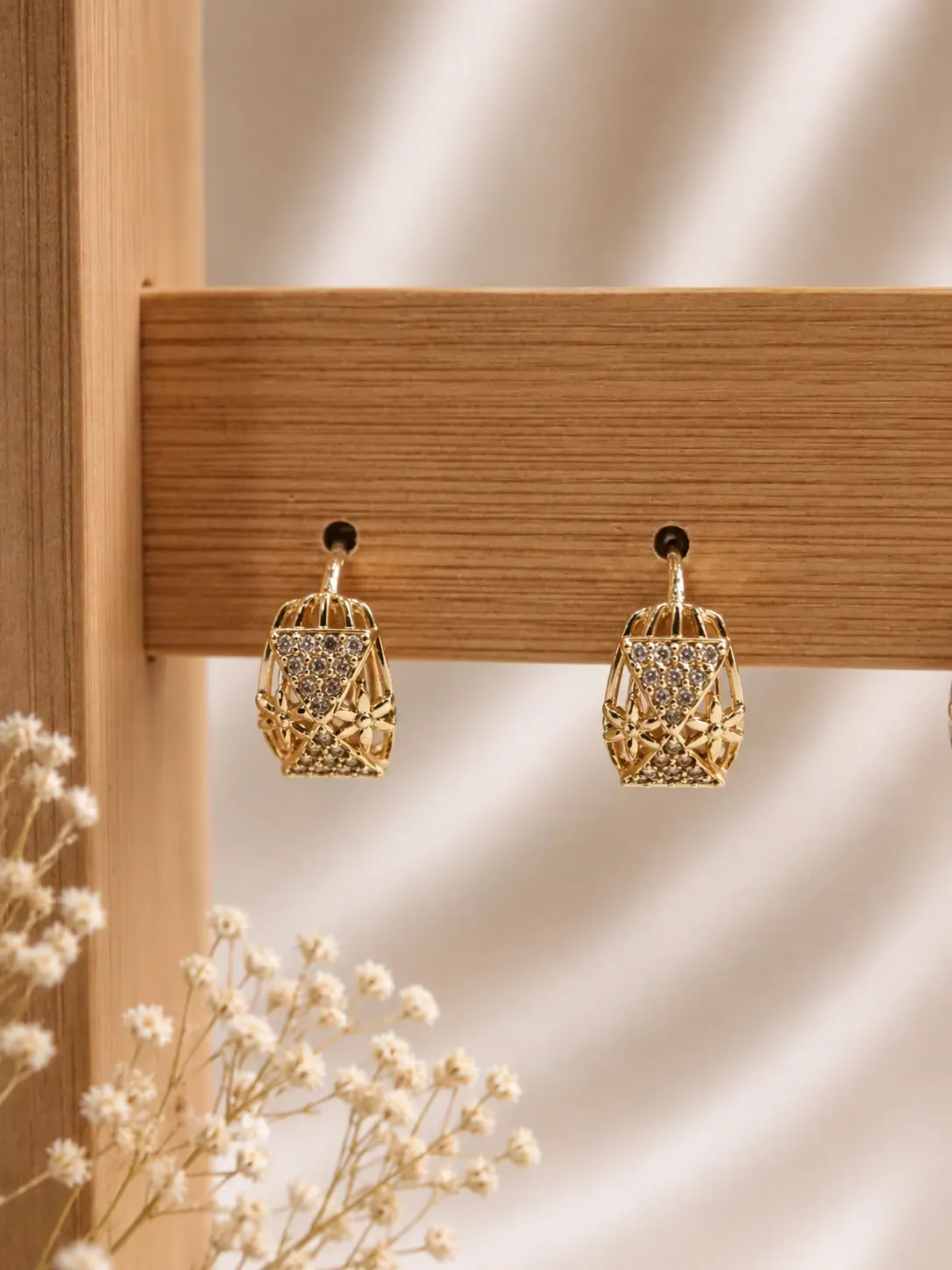 Gold Lattice Cage Drop Earrings with triangular clear accents and floral openwork