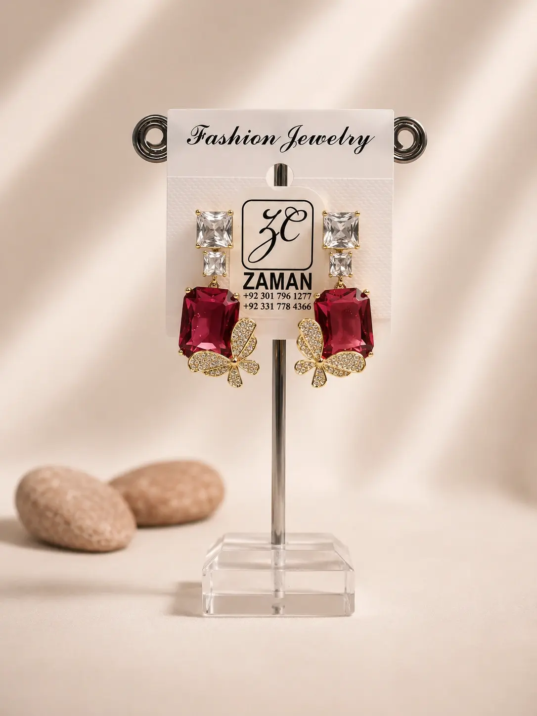 red butterfly statement drop earrings with clear square tops and red stones
