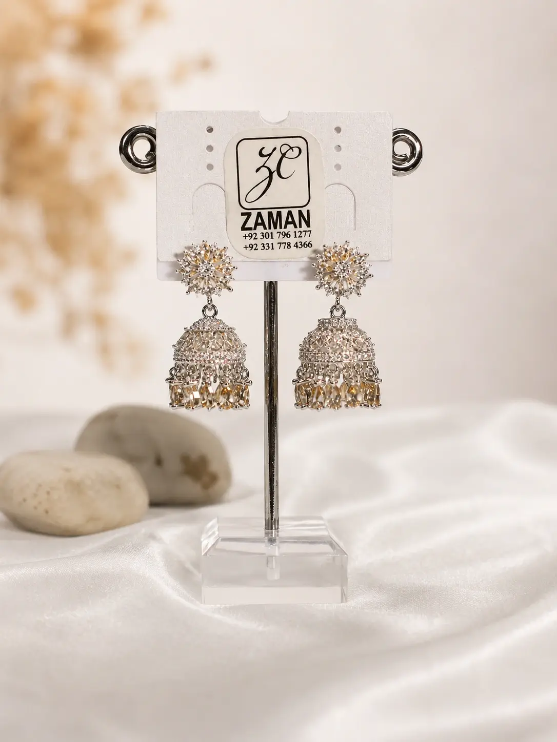 silver floral crystal drop jhumka earrings with openwork domes