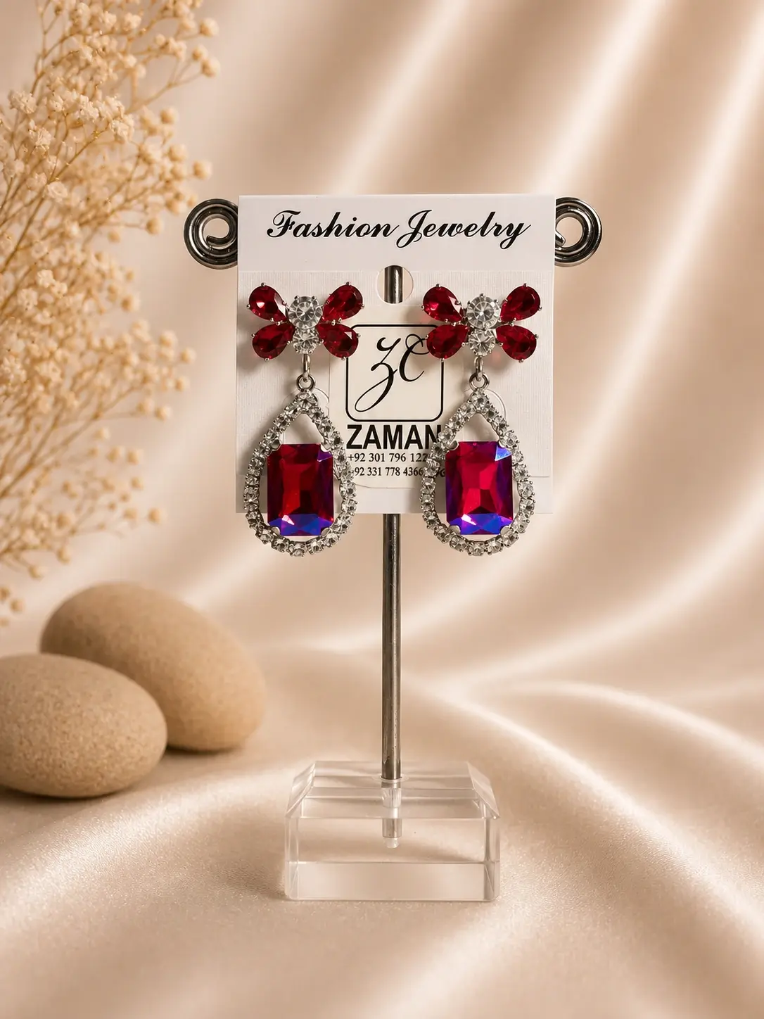 ruby red floral teardrop earrings with sparkling silver-tone frame