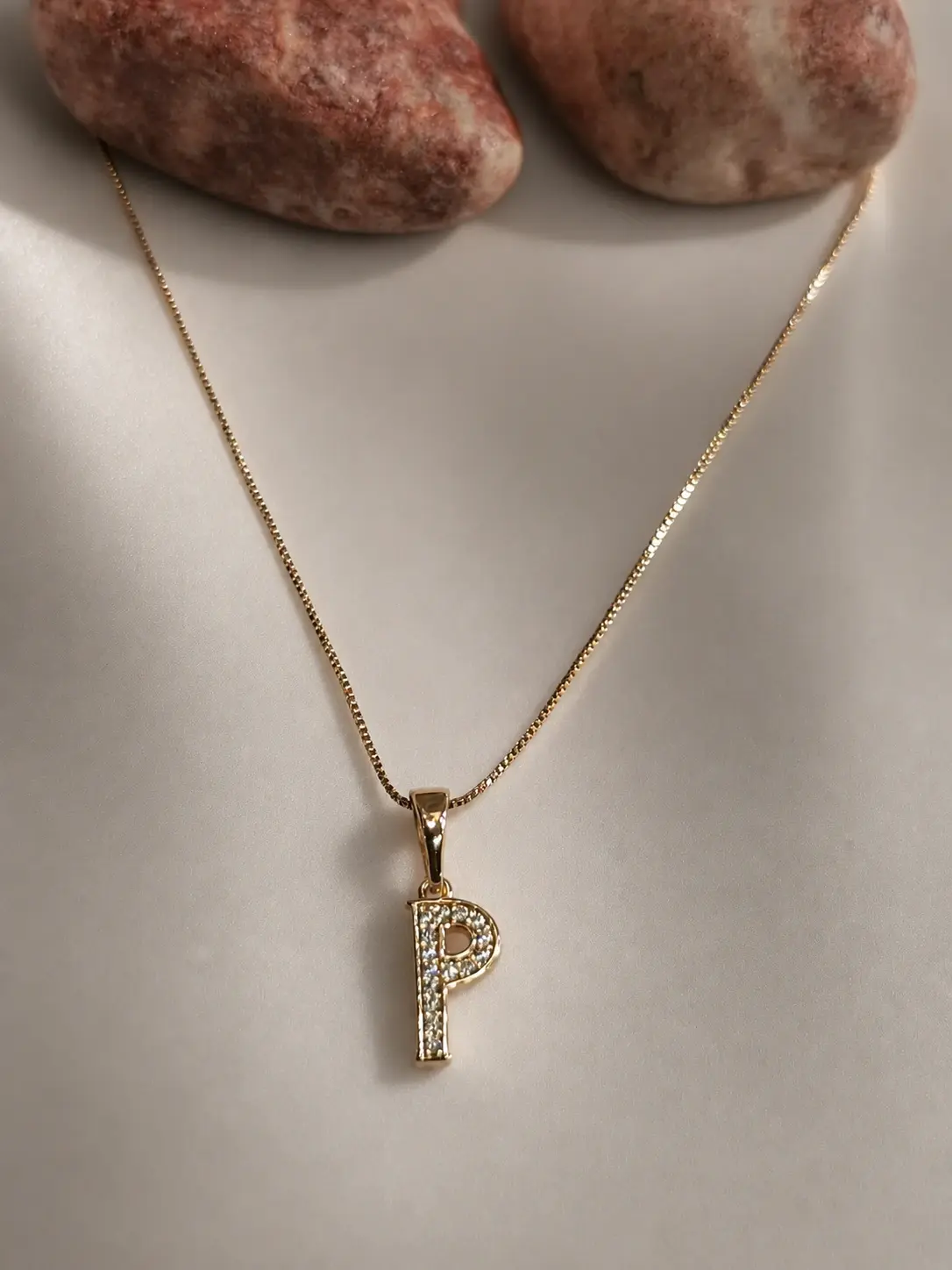 gold P initial stone necklace with sparkling letter pendant