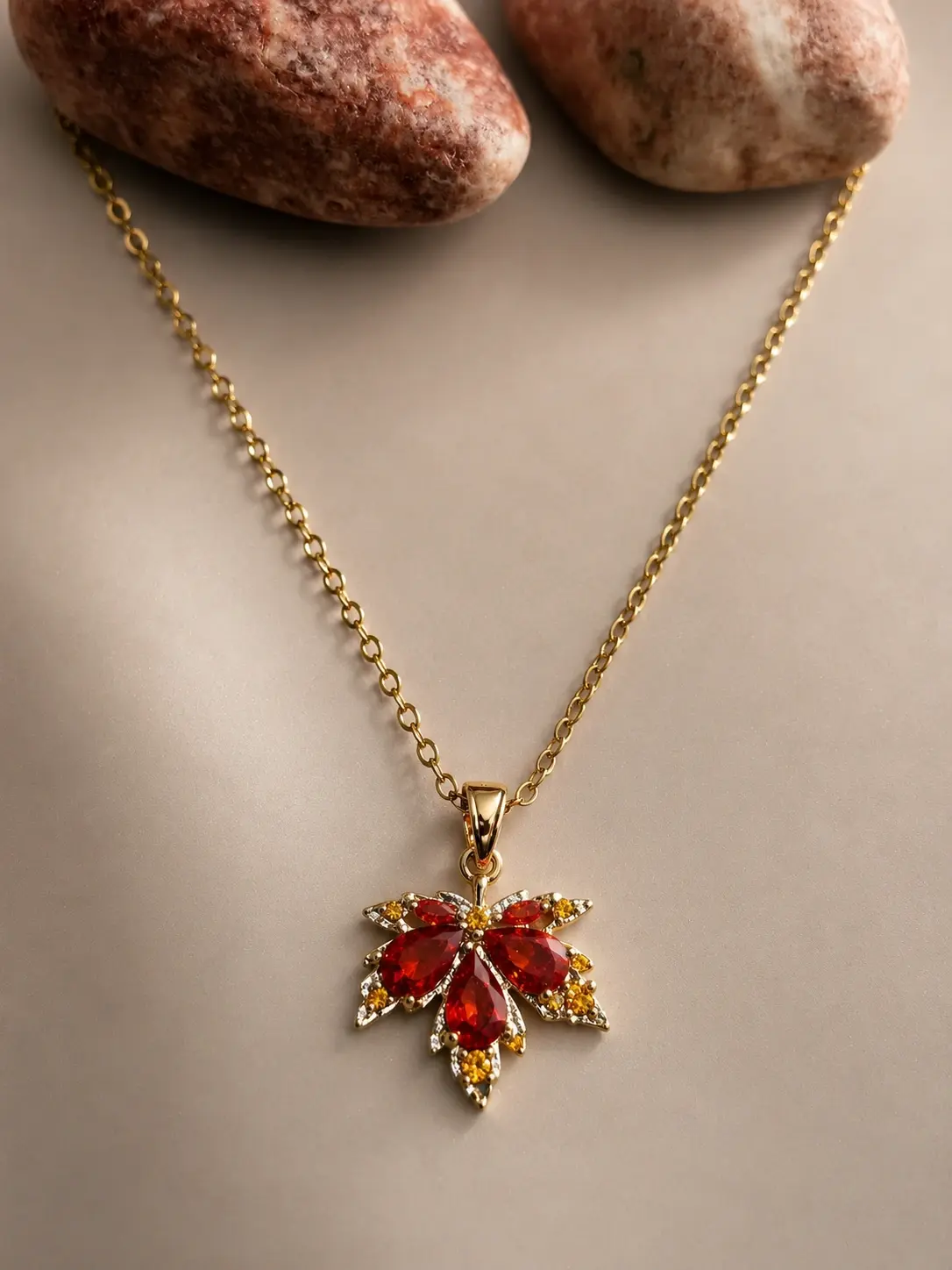 gold red floral stone necklace with pear shaped cluster pendant