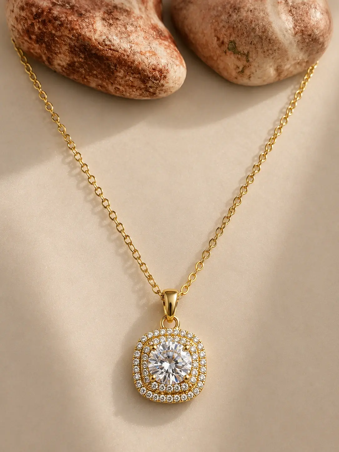 gold double halo stone necklace with clear round centerpiece