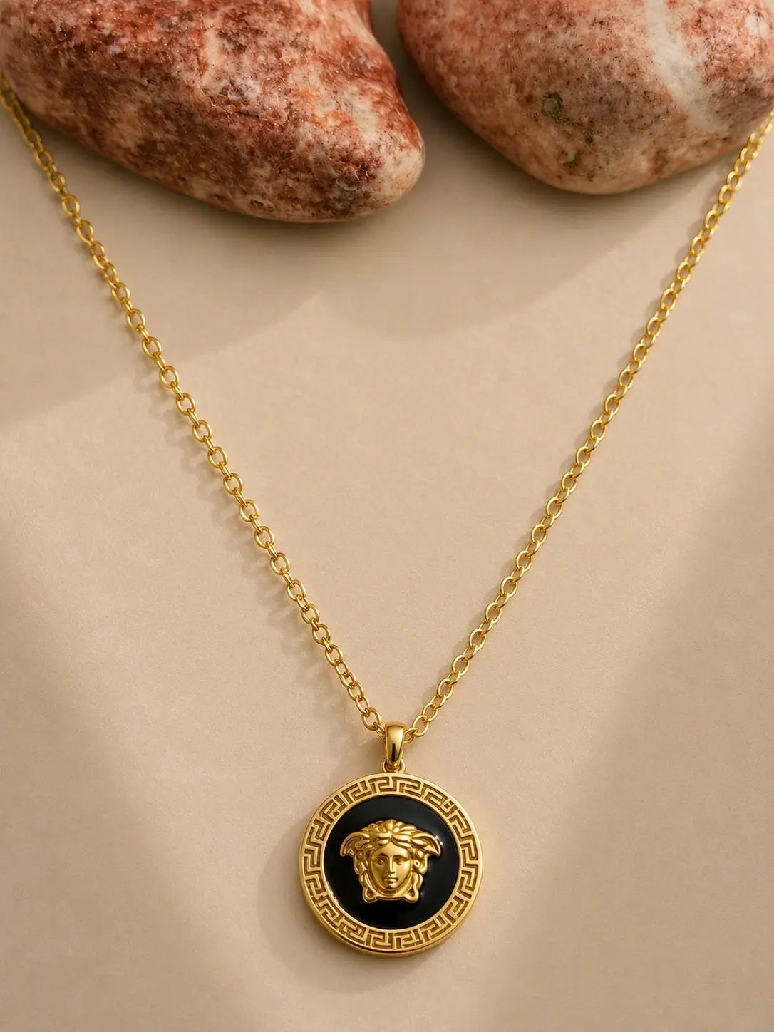 gold black Greek medallion necklace with engraved round pendant