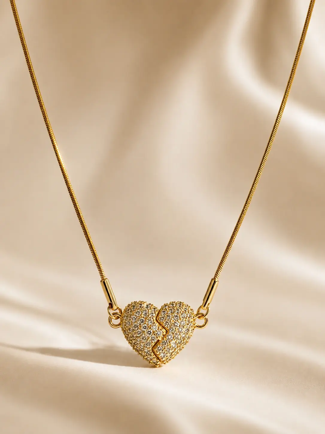 gold broken heart stone necklace with two-part pendant