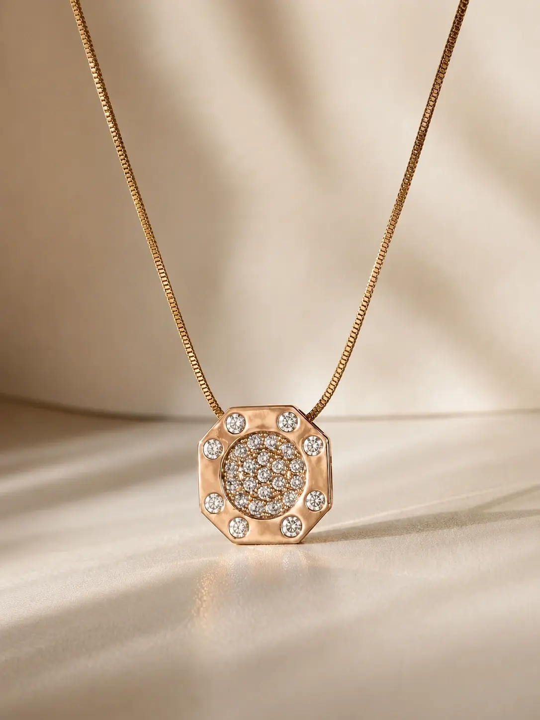 rose gold octagon stone necklace with eight clear outer accents
