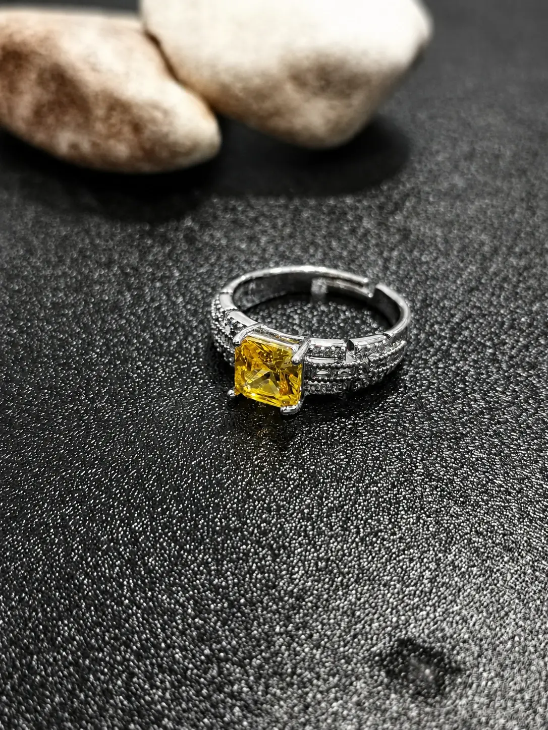 silver tone yellow square stone ring with clear shoulder accents