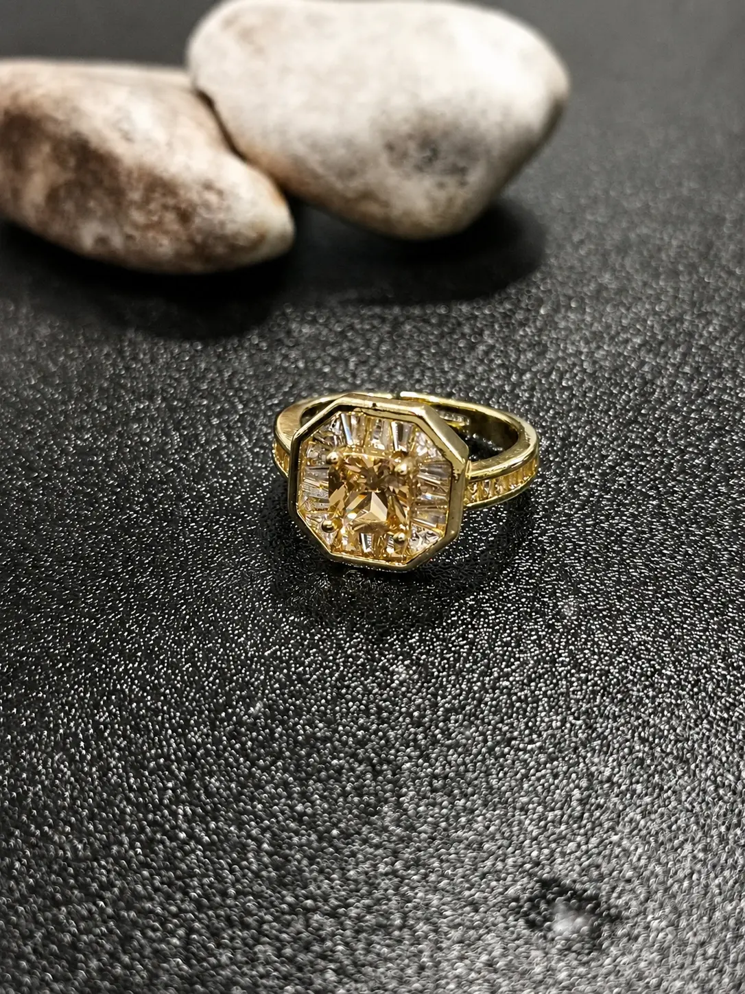 gold tone champagne octagonal halo ring with baguette accents