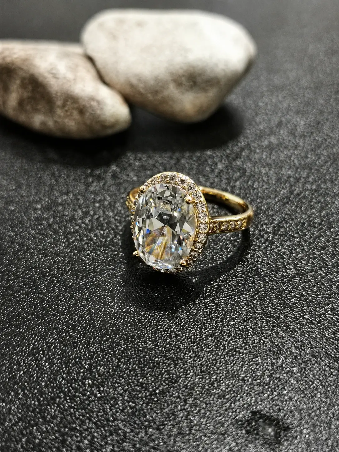 gold tone large oval halo ring with clear centre stone