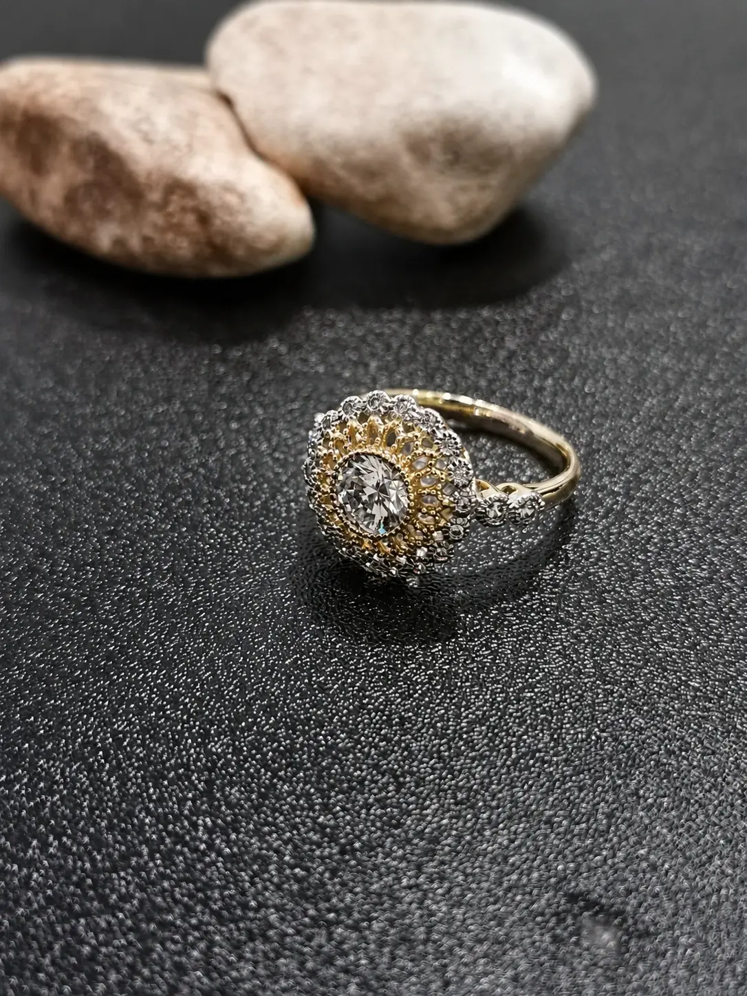 two tone floral halo statement ring with clear round centre stone