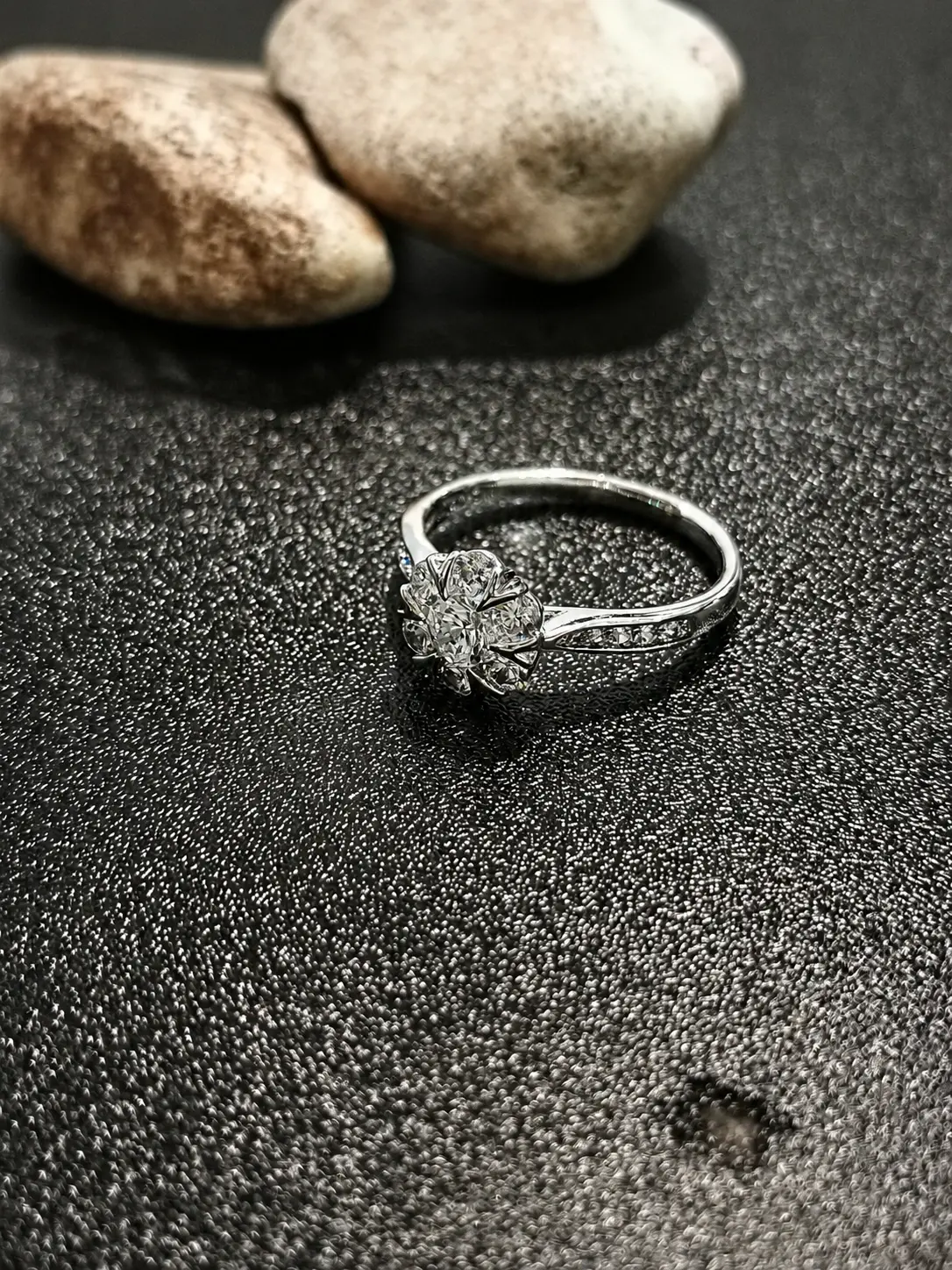 silver tone floral cluster ring with clear round stones